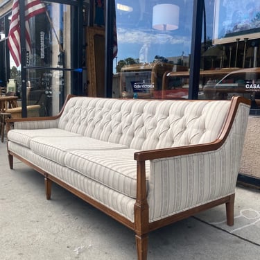 Overrated Jaunts | Mid-century Sofa with Buttoned Back and Wood Trim