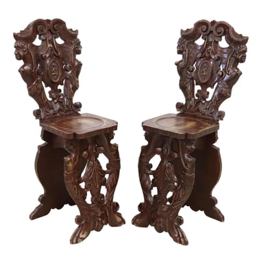 RENAISSANCE REVIVAL HERALDIC CARVED HALL CHAIRS