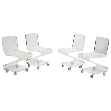 Lucite Chairs on Casters, circa 1970, Les Prismatiques