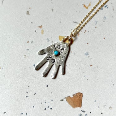 Let Go sterling silver hand with turquoise hamsa pendant 