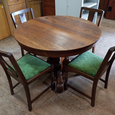 Round Table with Four Chairs