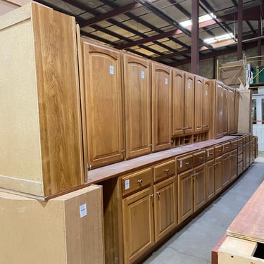 23 Piece Set of Kitchen Cabinets with Raised Arched Panel Doors by Merillat