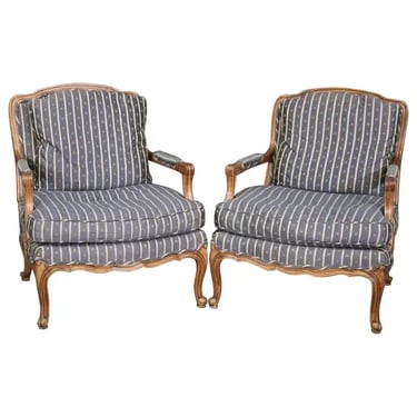 Pair of Baker Furniture Company Walnut Open Arm Bergere Louis XV