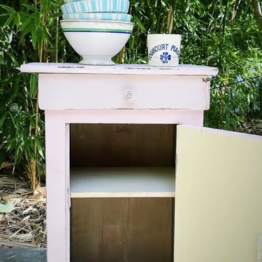 Beautiful rustic vintage French heavy wood painted pink cabinet 