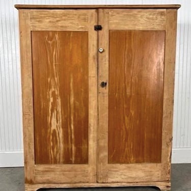 Rustic early American two door pine cabinet 