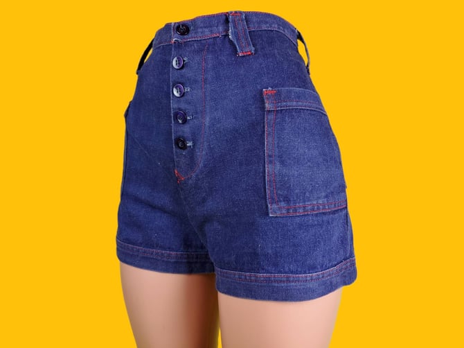 1960s denim shorts with a curvy 50s fit. Vintage jean shorts. High rise with exposed button fly. (28) 