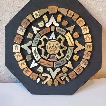 Vintage brass, copper and turquoise Aztec calendar decor 