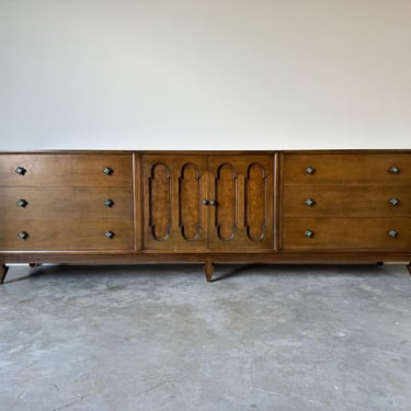 1970's Harold Schwartz for Romweber Pecan Triple Dresser With Decorative Bronze Pulls 