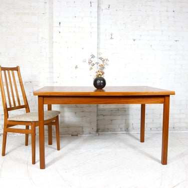 Vintage MCM teak rectangular dining table with pull out leafs | Free shipping only in NYC and Hudson Valley areas 