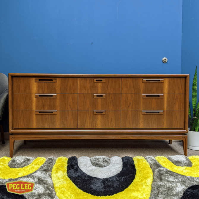 Mid-Century Modern walnut 9-drawer dresser by United Furniture