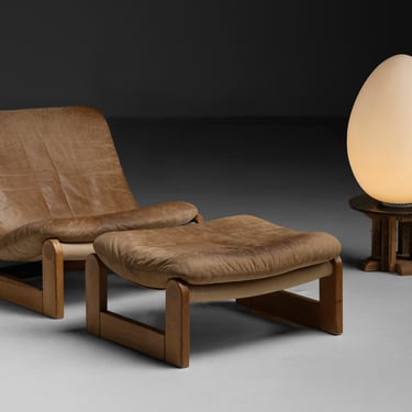 Sling Chair and Ottoman / Uovo Lamp