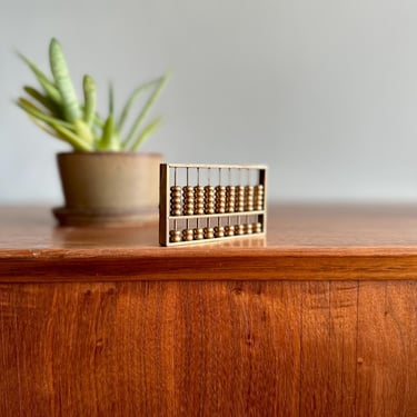 Vintage tiny brass abacus / adorable metal paperweight or fidget toy 