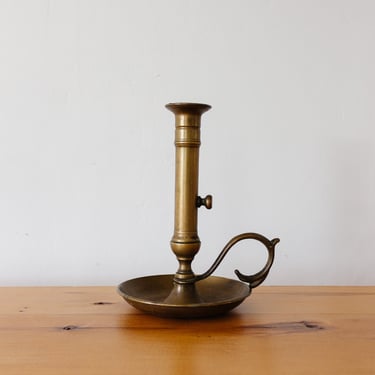 turn of the century French brass push up chamberstick