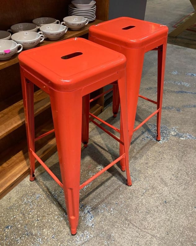 Orange metal stools 12” x 12” x 30” Call 202-232-8171 to purchase