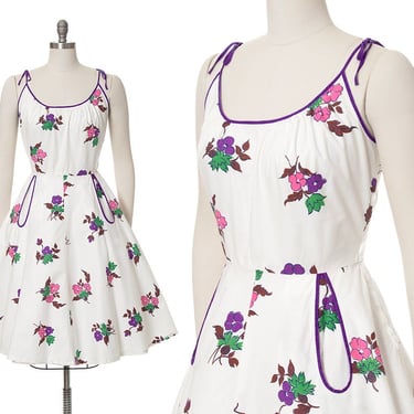 Vintage 1950s Sundress | 50s Floral Print Purple Piping White Cotton Tied Spaghetti Strap Fit and Flare Day Dress with Pockets (medium) 