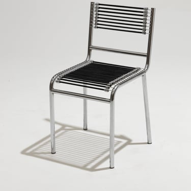 STEEL AND ELASTIC CORD CHAIR, RENÉ HERBST, 1970s