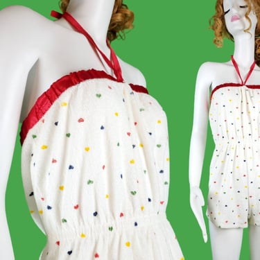 Vintage 70s/80s terry romper. White terry cloth with colorful heart print throughout. Best fit for a busty Small or Med. 