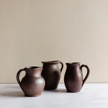 trio of vintage french stoneware pitchers
