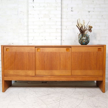 Vintage mcm danish teak credenza with sliding doors and 3 drawers | Free delivery in NYC and Hudson Valley areas 