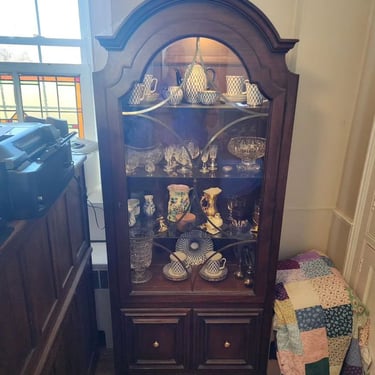 Arch Top Display Cabinet. Ethan Allen, lighted, 3 adjustable glass shelves, two door storage at base. 32x15x75