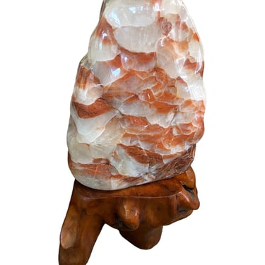 Large Red Calcite Stone on Wooden Base, Early 20th Century. Morocco.