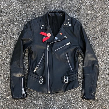 Collectible vintage ‘82 London punk rock biker jacket | black leather motorcycle jacket, worn to perfection, pins &amp; skull studs, 36/38 