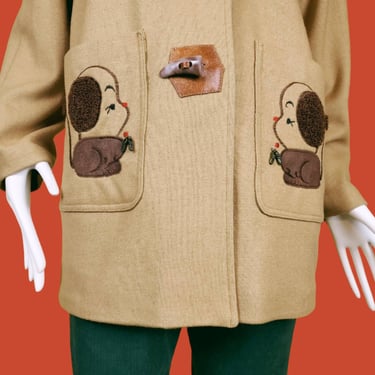 Vintage knit wool coat with hood. Beige w/ embellished puppy dogs on the pockets. Toggle buttons leather. 60s mod unique novelty. (Size M) 
