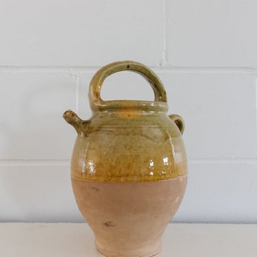 19th century French Provençal yellow glaze terra cotta wine vessel