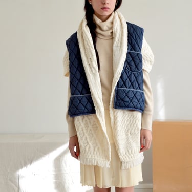 blue quilted high low vest 
