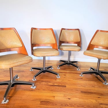 Vintage Brody Set of Four Bent Plywood and Vinyl Swivel Chairs 