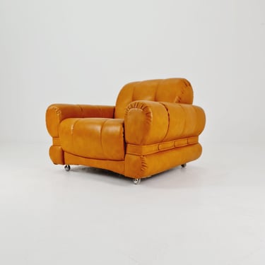 Italian space age single lounge cognac-colored on wheels, 1970s 