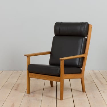 Hans Wegner GE 265 armchair  for Getama in Oak & Black Leather, Denmark 1970/80s 