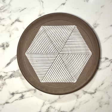 Handthrown 1970s studio ceramic plate with hexagonal/triangular incised pattern signed Walz 