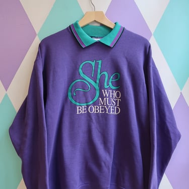 Vintage “She Who Must Be Obeyed” Graphic Sweatshirt – Purple with Teal Collar