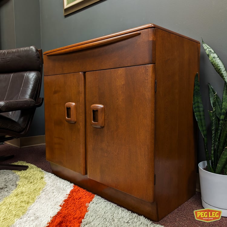 Mid-Century Modern cabinet with walnut finish by Heywood Wakefield