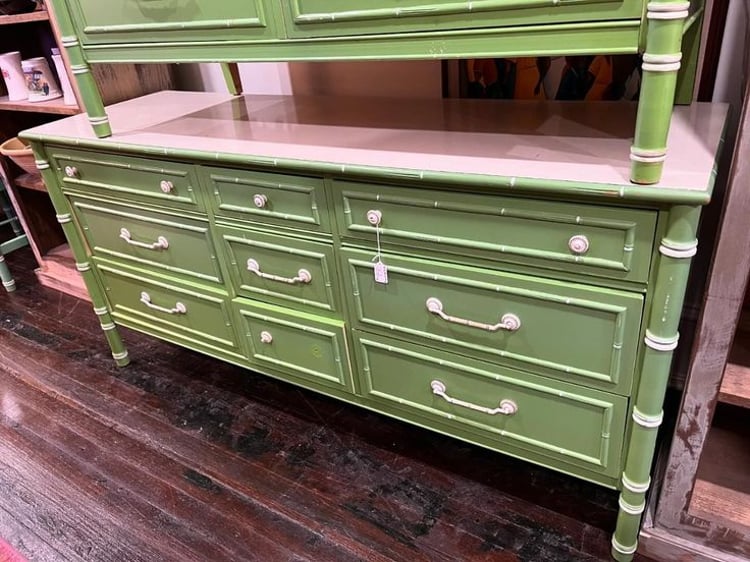 Green and white faux bamboo 9 drawer dresser. Bottom middle drawer is missing a drawer pull. 62” x 19” x 30” 