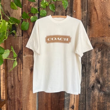 Vintage 90s Coach Spellout logo cream colored t shirt size L 