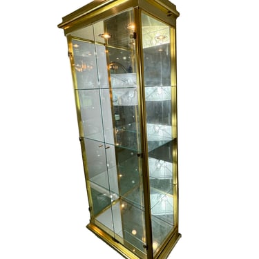 1970s to 1980s Modern Hollywood Regency Mastercraft Style Brass + Glass Lighted Vitrine Display Cabinet with Four Shelves.