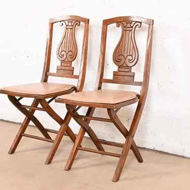 Antique Arts & Crafts Carved Oak Lyre Back Folding Chairs by Phoenix Chair Co., Pair