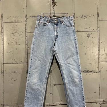 Vintage 90s lightwash Levis 505 straight leg Fit Red Tab Classic Brand 1990s Fashion Made in USA Streetwear Pants 34 Waist distressed 