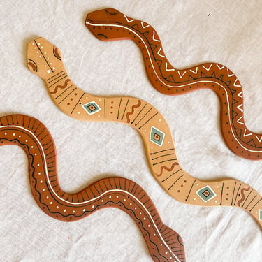 Kelsey Melville Wall Snakes