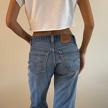 29 Levis 501 vintage faded jeans / vintage light wash faded worn in holes high waisted button fly boyfriend Levis 501 jeans USA | 29 