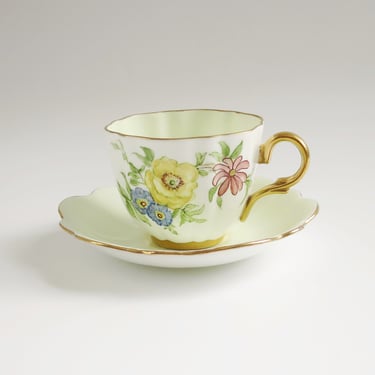 Vintage English Tea Cup and Saucer by Kent, Floral Foreground on a Chiffon Green Background 