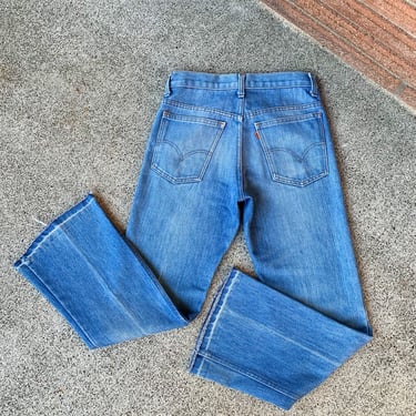 70s orange tab Levis with hem fade and creases 