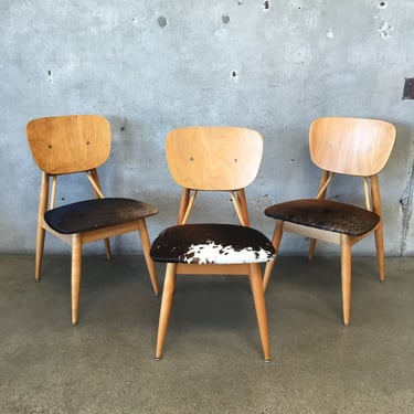 Three Piece Wooden Prototype Chairs with Cowhide Seats