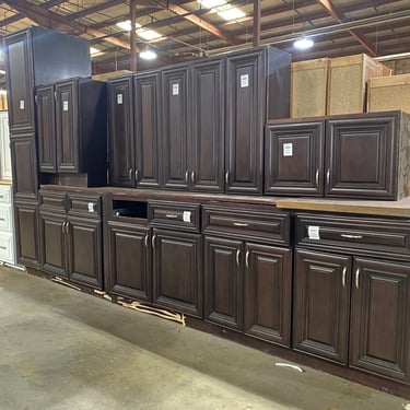 10 Piece Set of Dark Stained Kitchen Cabinets