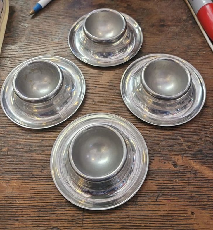Four 18/10 Egg Cups. Made in Germany.