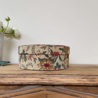 Beautiful vintage French round fabric  box with paper lining 