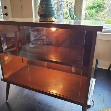 Vintage cabinet brown all original with glass sliding doors, 1950's 