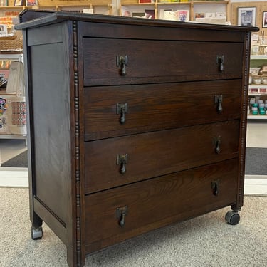 Free Shipping Within Continental US - Vintage Four Drawer Dresser on Casters With Carved Wood Detailing. 